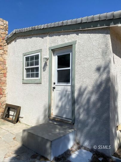 416 North Helena Street Ridgecrest, CA 93555 - Photo 19 of 22 a view of outdoor space with wooden floor and windows