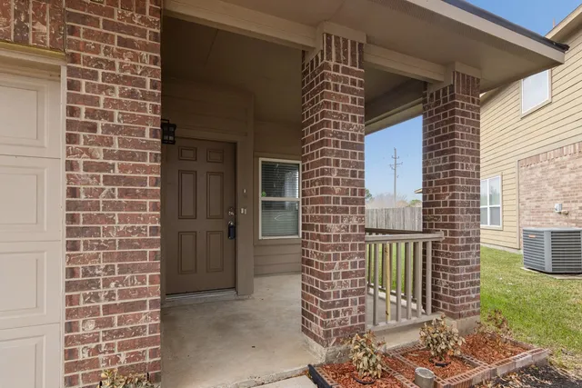 a view of a door with a chair