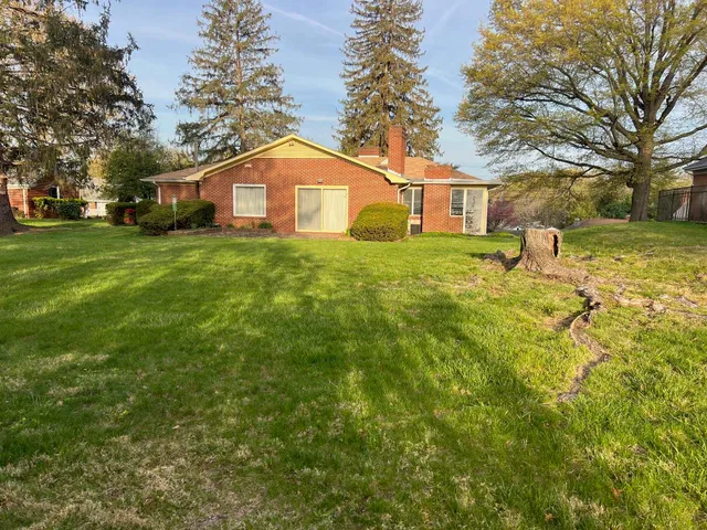 a kitchen with stainless steel appliances kitchen island a large counter top and a view of kitchen