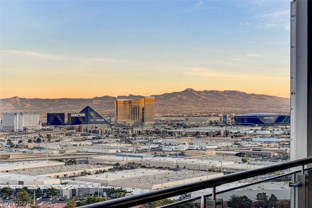 4381 West Flamingo Road, Unit 3002 Las Vegas, NV 89103 - Photo 36 of 59 Dramatic mountain and city panoramas unfold from this elevated terrace space.