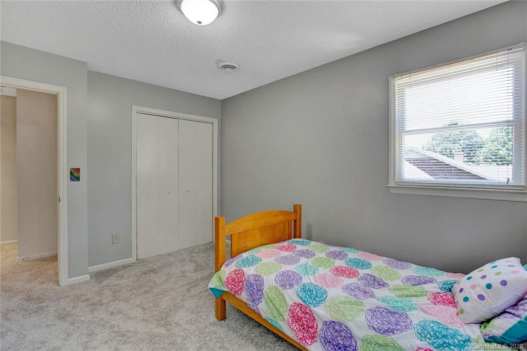 220 South Mccoy Road Salisbury, NC 28144 - Photo 14 of 46 a bedroom with a bed and a window