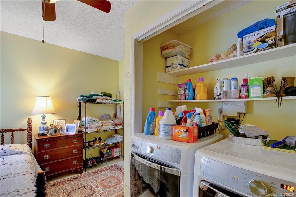 220 South Mccoy Road Salisbury, NC 28144 - Photo 23 of 46 a bedroom with a bed and cabinets