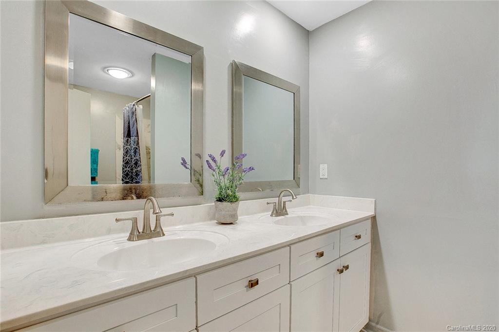 220 South Mccoy Road Salisbury, NC 28144 - Photo 7 of 46 a bathroom with a sink and a mirror
