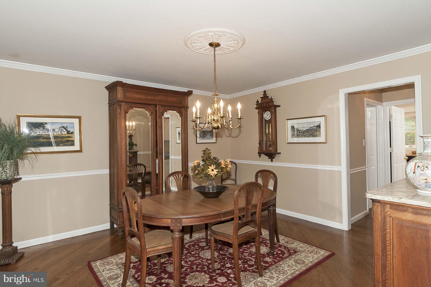 14903 Peach Orchard Road Silver Spring, MD 20905 - Photo 7 of 30 a view of a dining room with furniture
