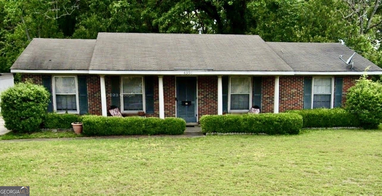 4356 Narrow Lane Road Montgomery, AL 36116 - Photo 1 of 1 a view of house with garden and large windows