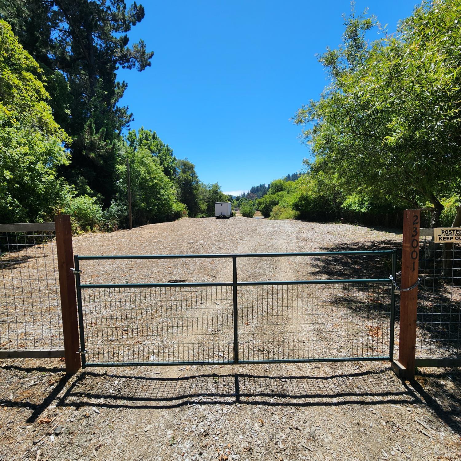 23001 Conifer Drive Monte Rio, CA 95462 - Photo 6 of 20 Gated entrance to the property. Looking at the upper-level area.