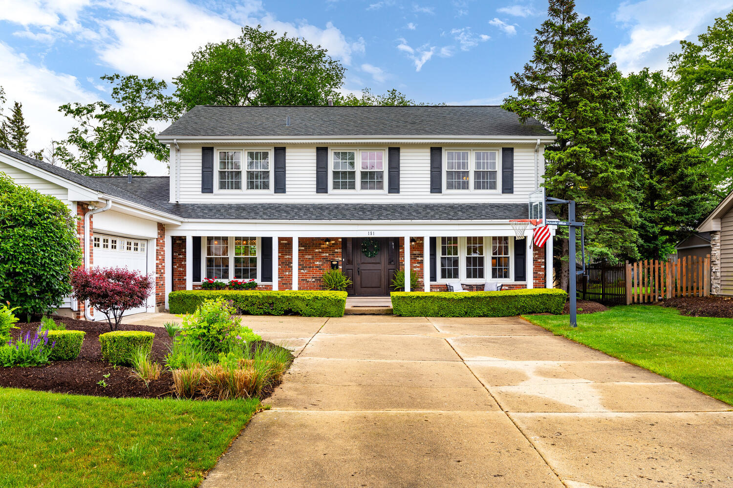 2S151 Stratford Road Glen Ellyn, IL 60137 - Photo 1 of 48 a front view of a house with a yard