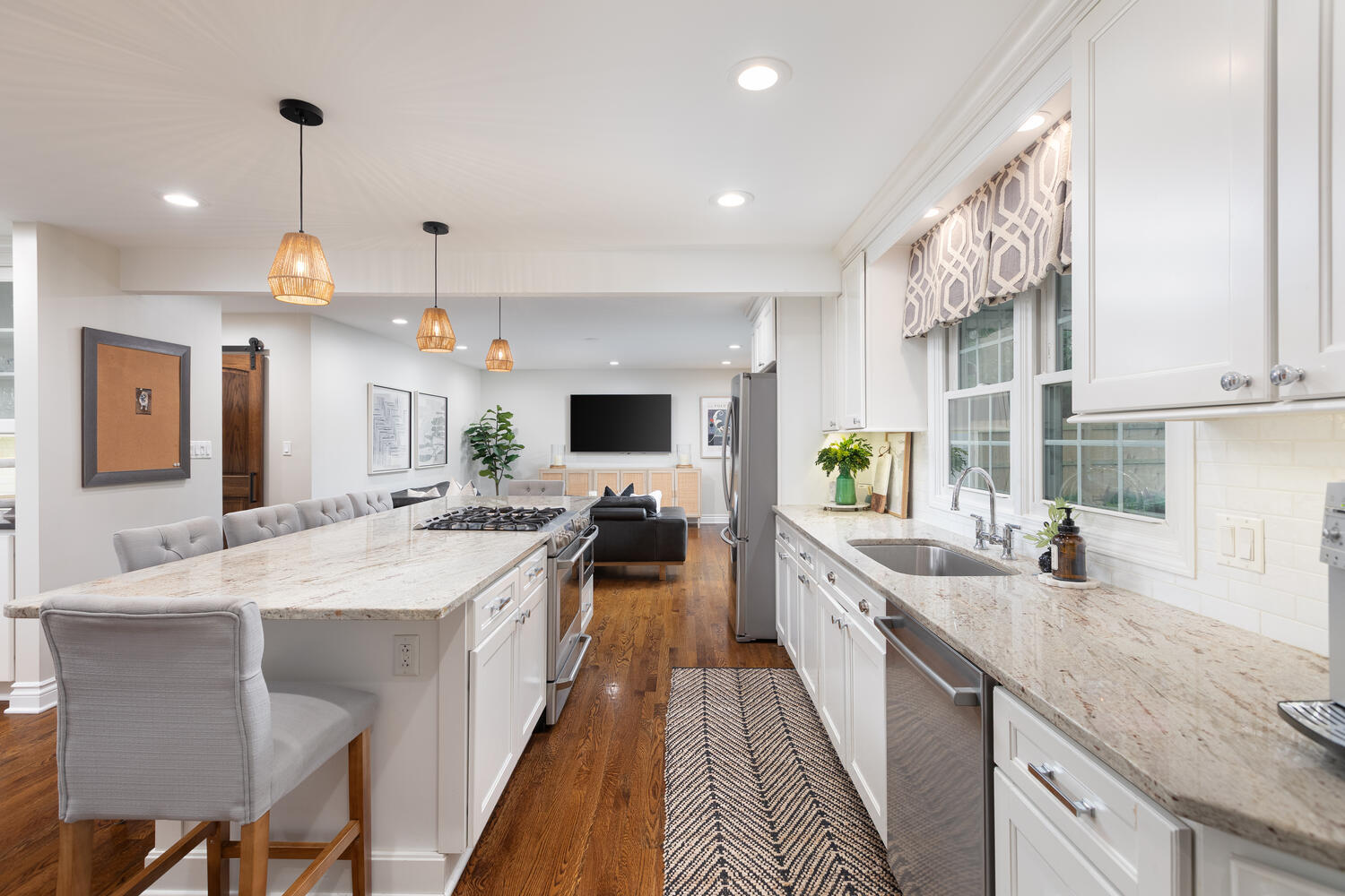 2S151 Stratford Road Glen Ellyn, IL 60137 - Photo 15 of 48 a large kitchen with a large island in the center