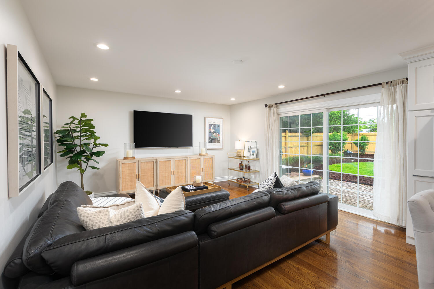 2S151 Stratford Road Glen Ellyn, IL 60137 - Photo 18 of 48 a living room with furniture and a flat screen tv