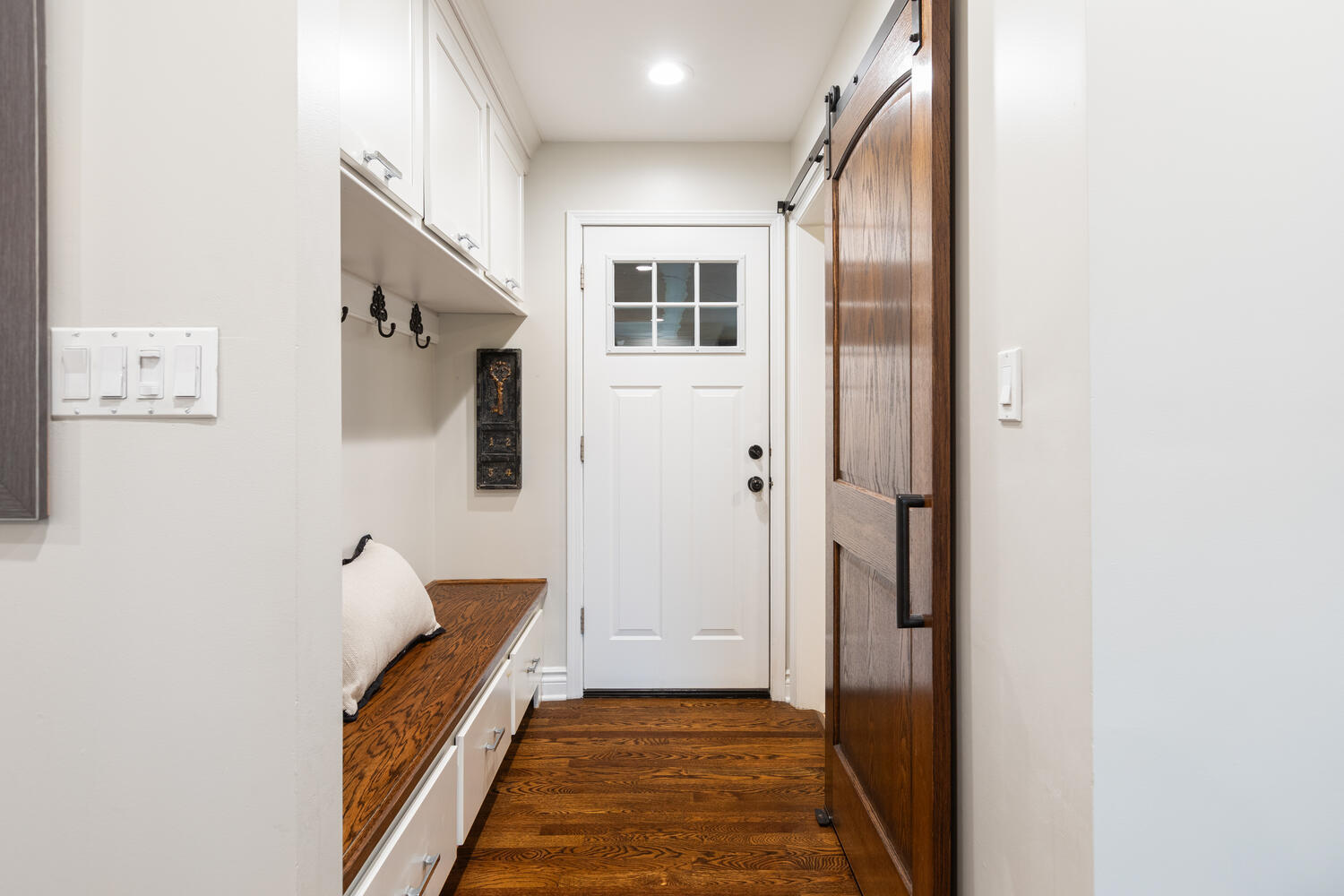 2S151 Stratford Road Glen Ellyn, IL 60137 - Photo 21 of 48 a view of a hallway with wooden floor and staircase