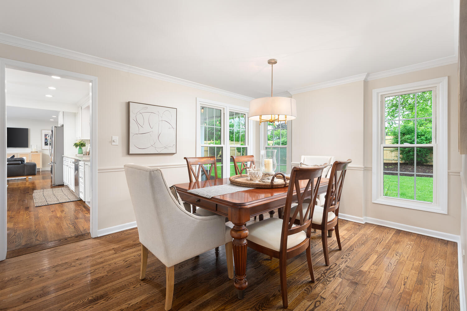 2S151 Stratford Road Glen Ellyn, IL 60137 - Photo 22 of 48 a view of a dining room with furniture window and wooden floor