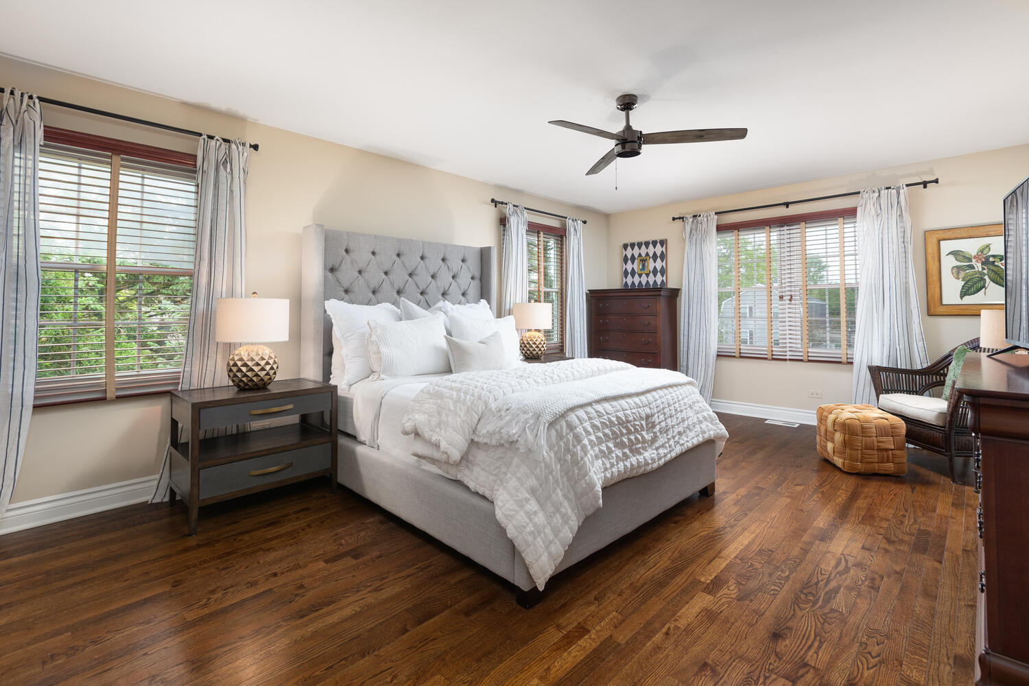 2S151 Stratford Road Glen Ellyn, IL 60137 - Photo 29 of 48 a bedroom with a bed wooden floor and windows