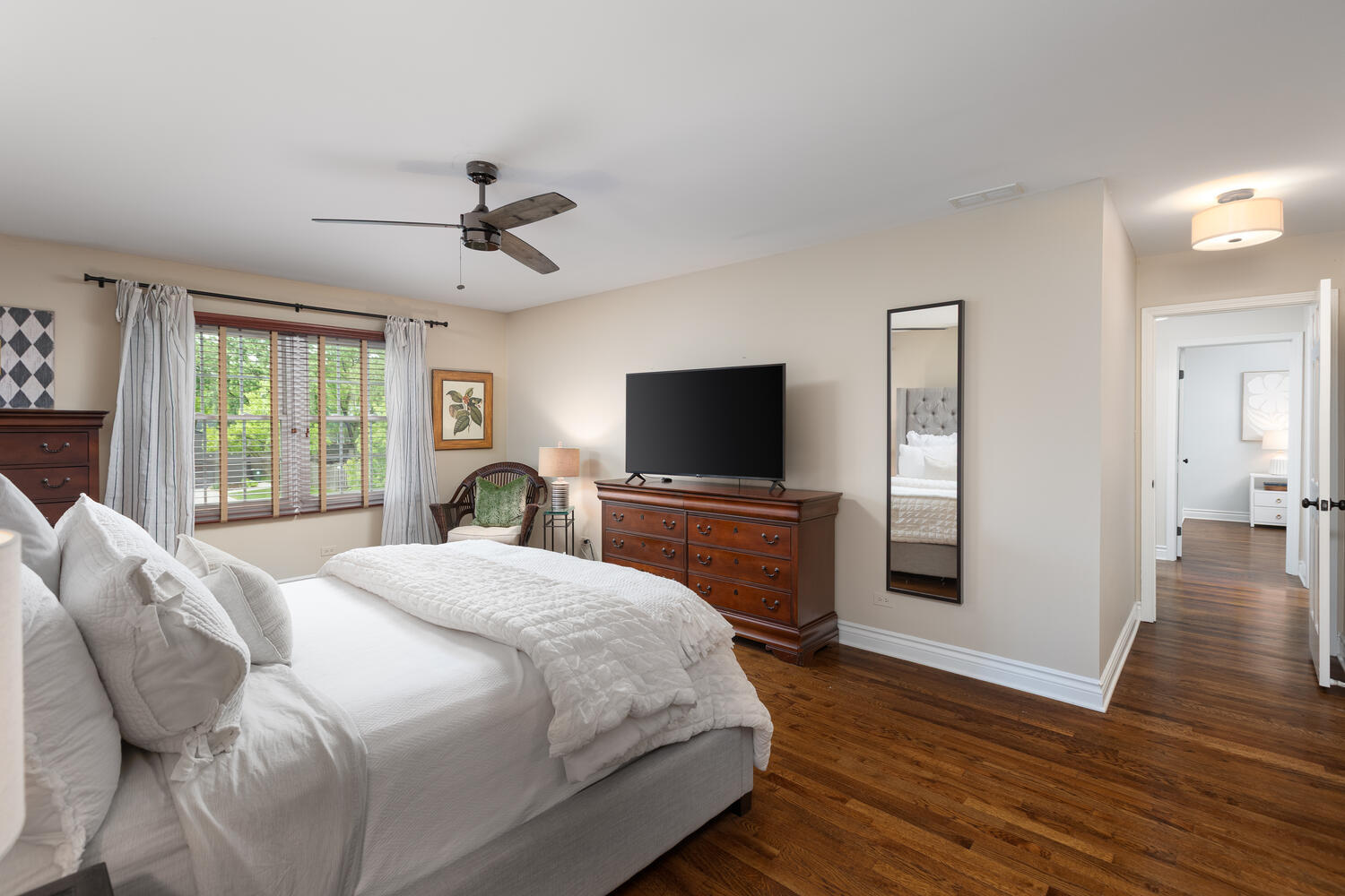 2S151 Stratford Road Glen Ellyn, IL 60137 - Photo 30 of 48 a bedroom with a bed and a flat screen tv