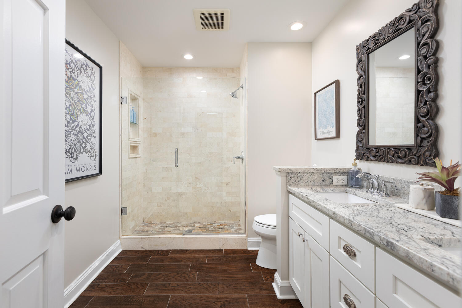 2S151 Stratford Road Glen Ellyn, IL 60137 - Photo 31 of 48 a bathroom with a granite countertop sink toilet and shower