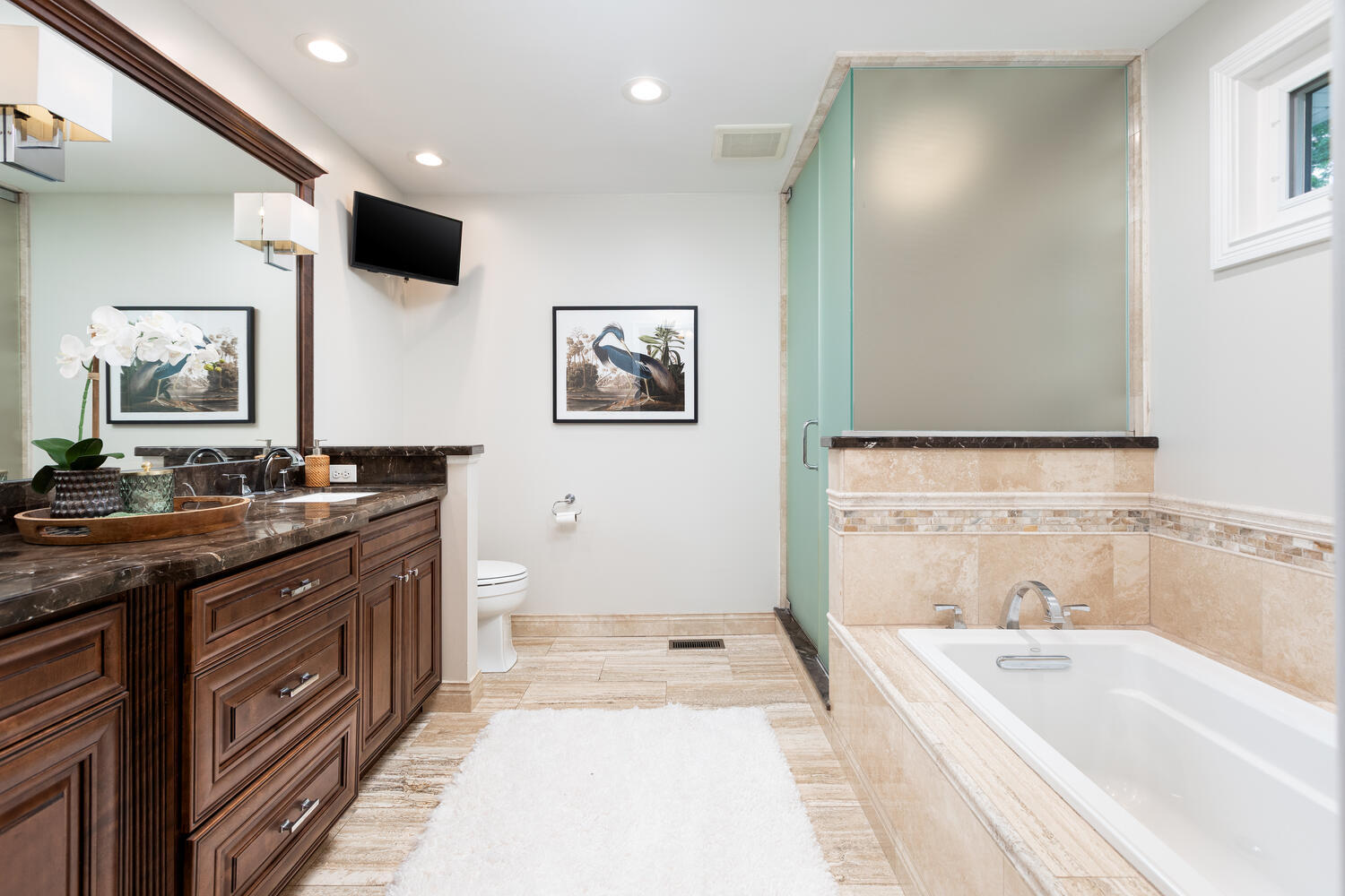 2S151 Stratford Road Glen Ellyn, IL 60137 - Photo 32 of 48 a spacious bathroom with a tub sink and mirror