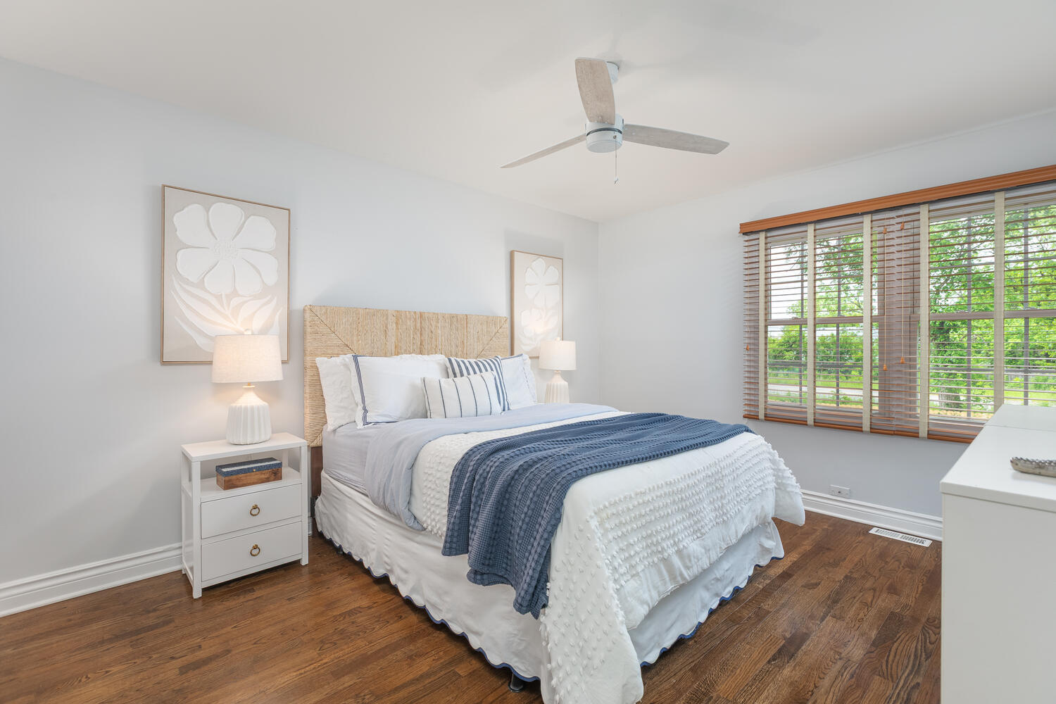 2S151 Stratford Road Glen Ellyn, IL 60137 - Photo 36 of 48 a large bed sitting in a bedroom next to a window