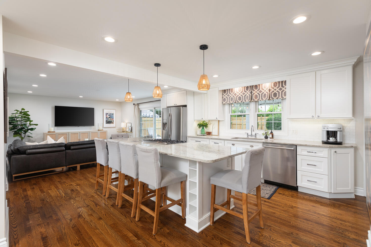 2S151 Stratford Road Glen Ellyn, IL 60137 - Photo 10 of 48 a kitchen with stainless steel appliances kitchen island granite countertop a sink and cabinets