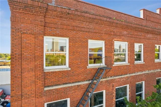 a view of gym equipment and wooden floor