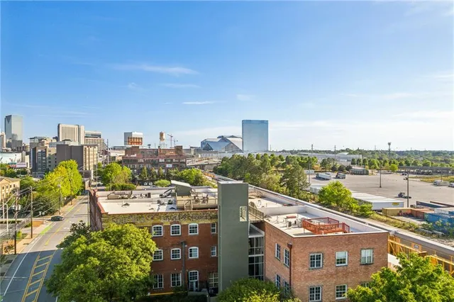 a view of a city with tall buildings