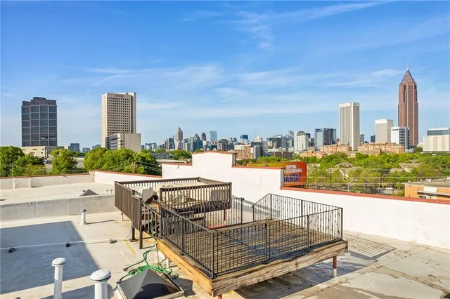 a view of a terrace with seating area