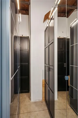 a view of a living room and wooden floor