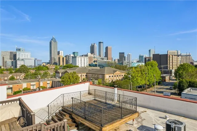 a view of a balcony with city view