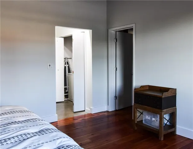 a view of balcony with wooden floor