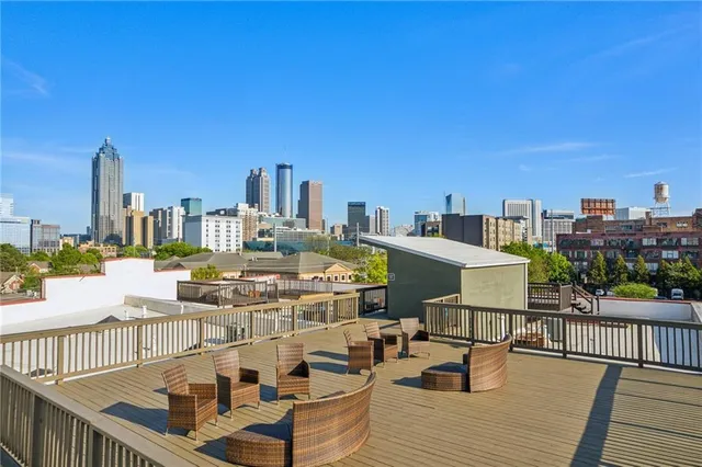 a view of a balcony with city view