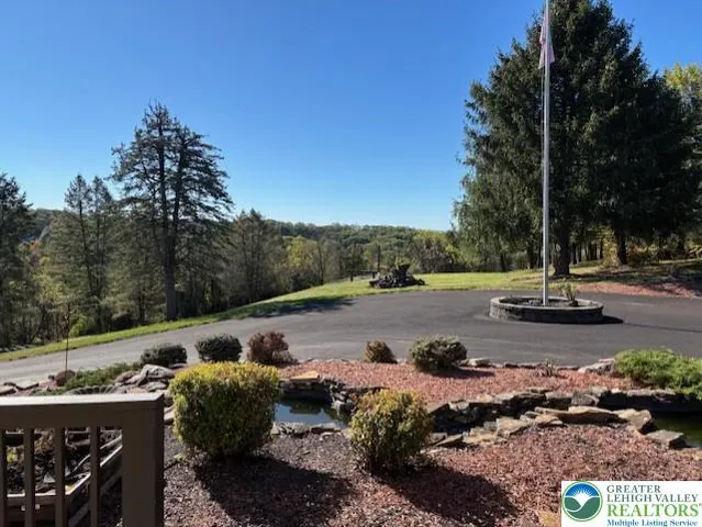 a view of a street with a park