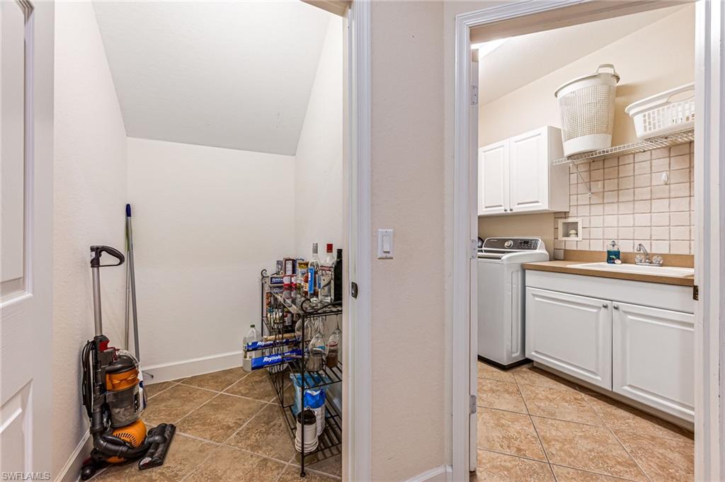 26437 Lucky Stone Road, Unit 102 Bonita Springs, FL 34135 - Photo 21 of 25 a view of a storage & utility room