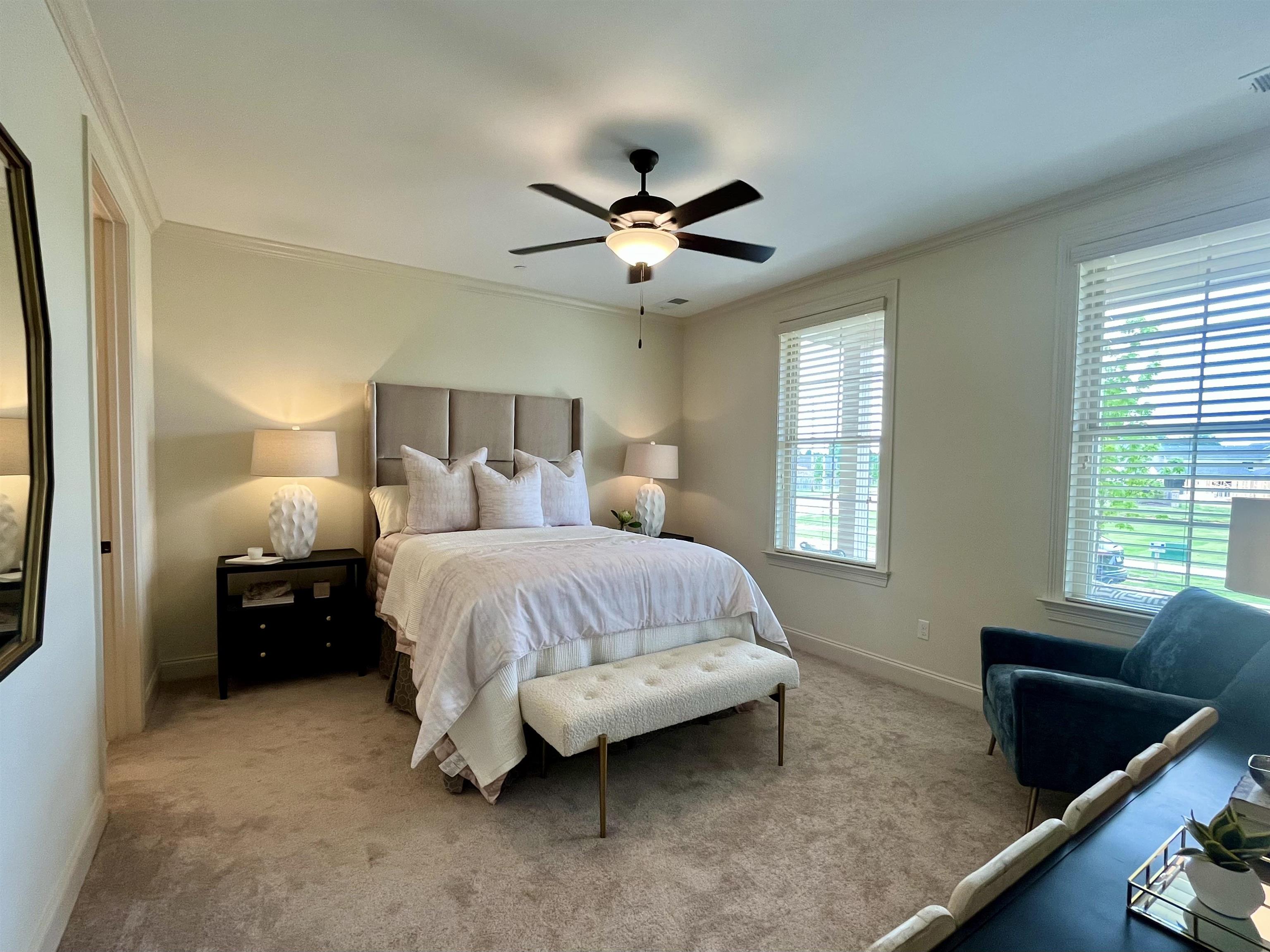 558 Ashburn Drive Collierville, TN 38017 - Photo 11 of 21 a spacious bedroom with a bed and window