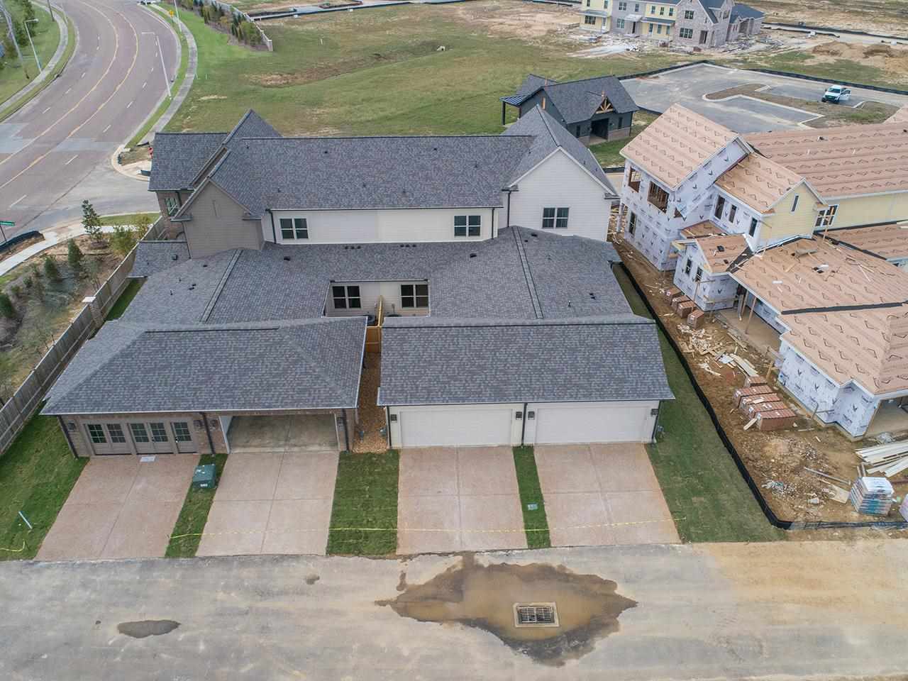 558 Ashburn Drive Collierville, TN 38017 - Photo 14 of 21 an aerial view of a house with a yard and lake view