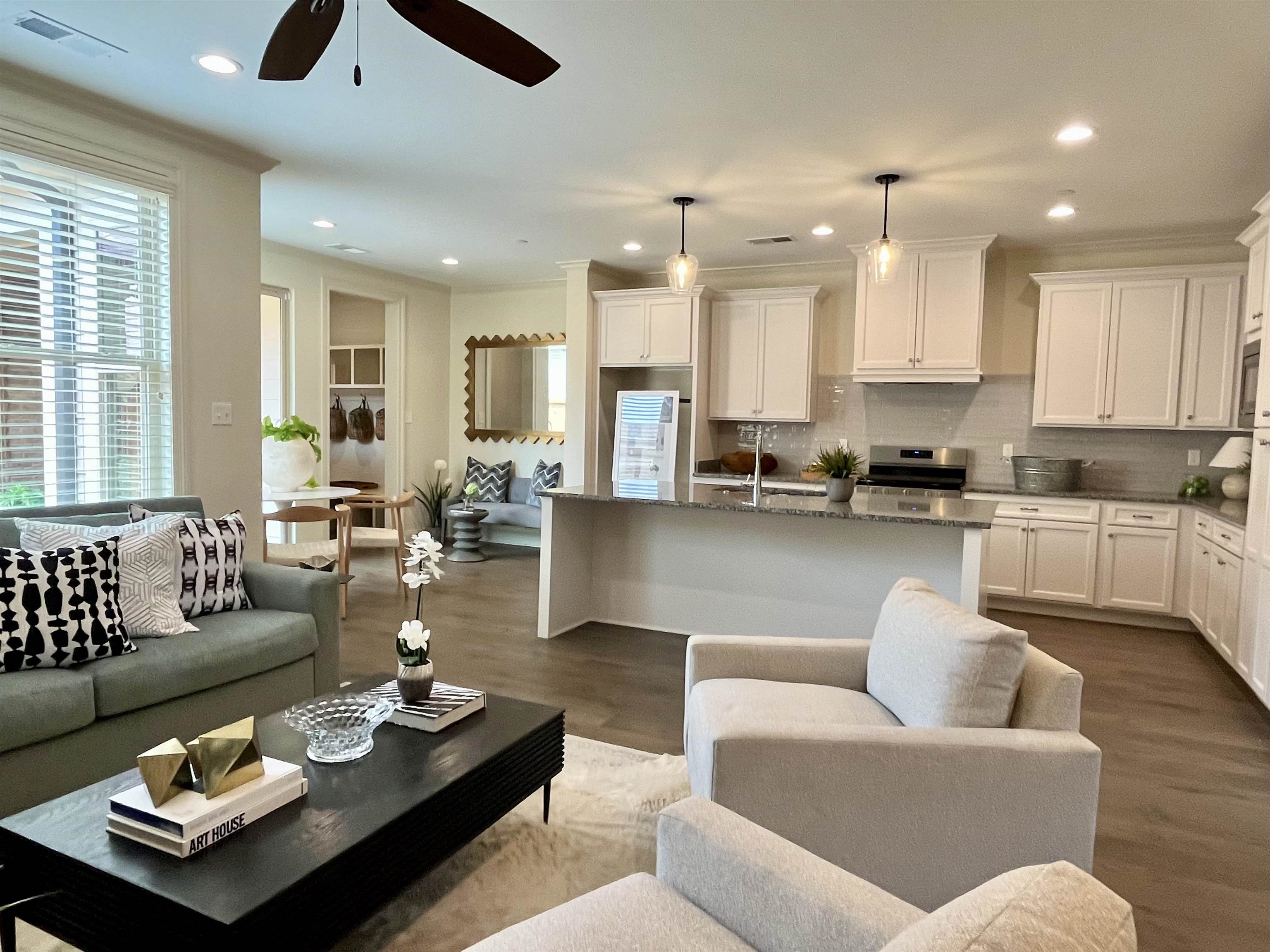 558 Ashburn Drive Collierville, TN 38017 - Photo 7 of 21 a living room with furniture kitchen and a large window