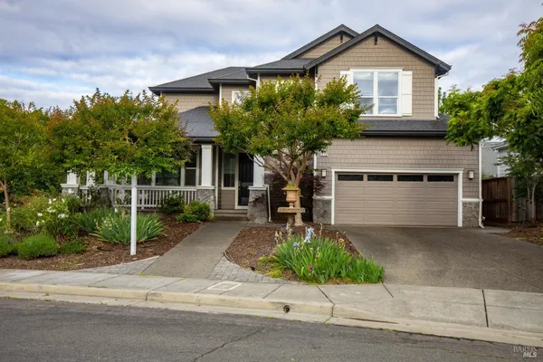 front view of a house with a garden