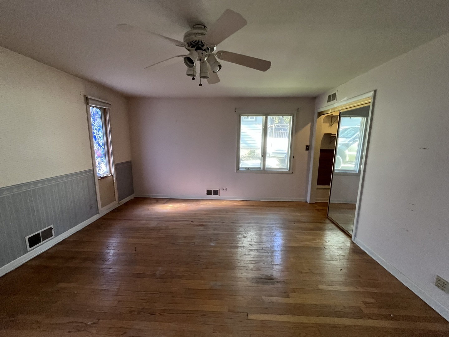 1700 Forest Avenue Des Plaines, IL 60018 - Photo 20 of 20 a view of an empty room with wooden floor and a window