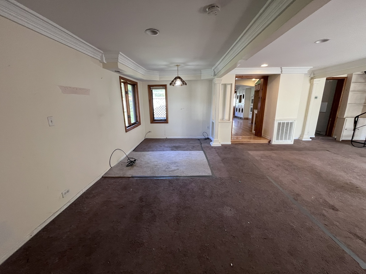 1700 Forest Avenue Des Plaines, IL 60018 - Photo 6 of 20 a view of a hallway with wooden floor and windows