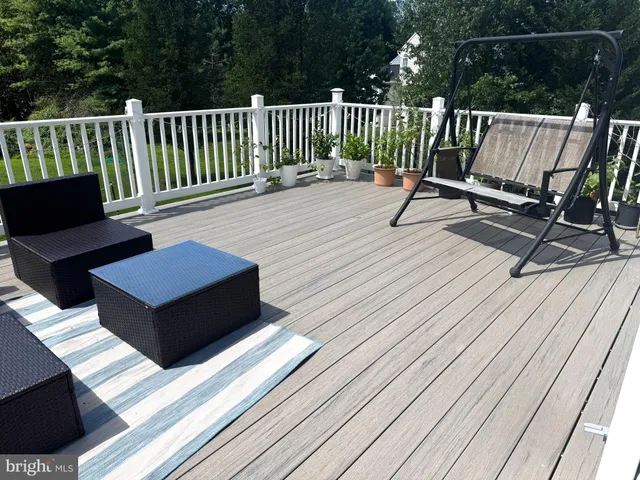 a view of a two chairs on the deck