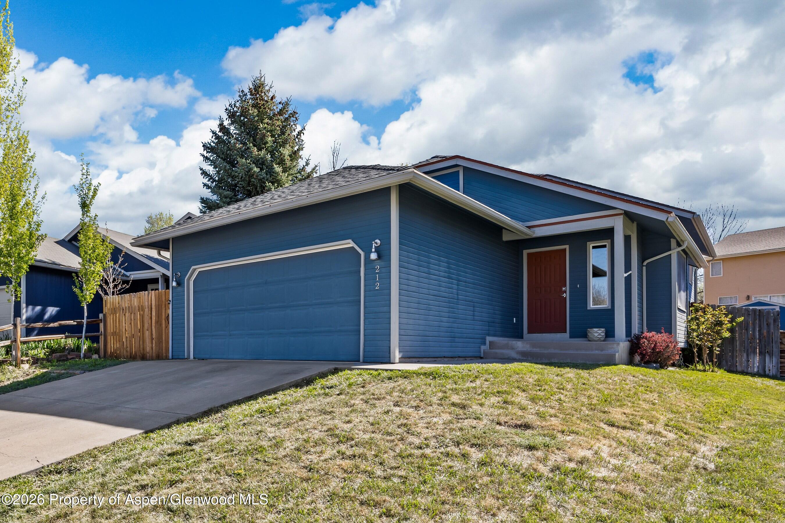 212 Safflower Court New Castle, CO 81647 - Photo 1 of 27 a house view with a backyard space