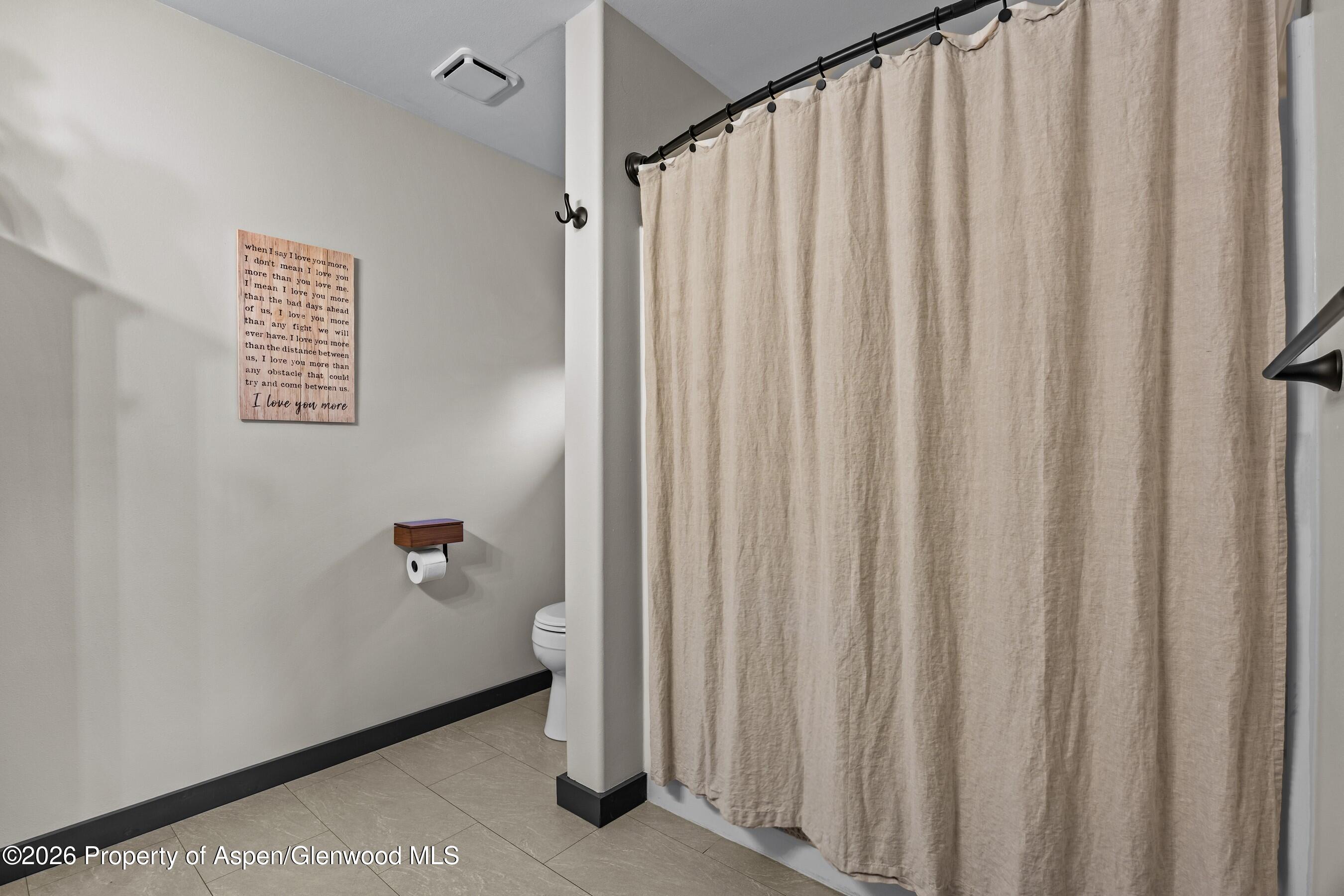 212 Safflower Court New Castle, CO 81647 - Photo 13 of 27 a view of a bathroom with window
