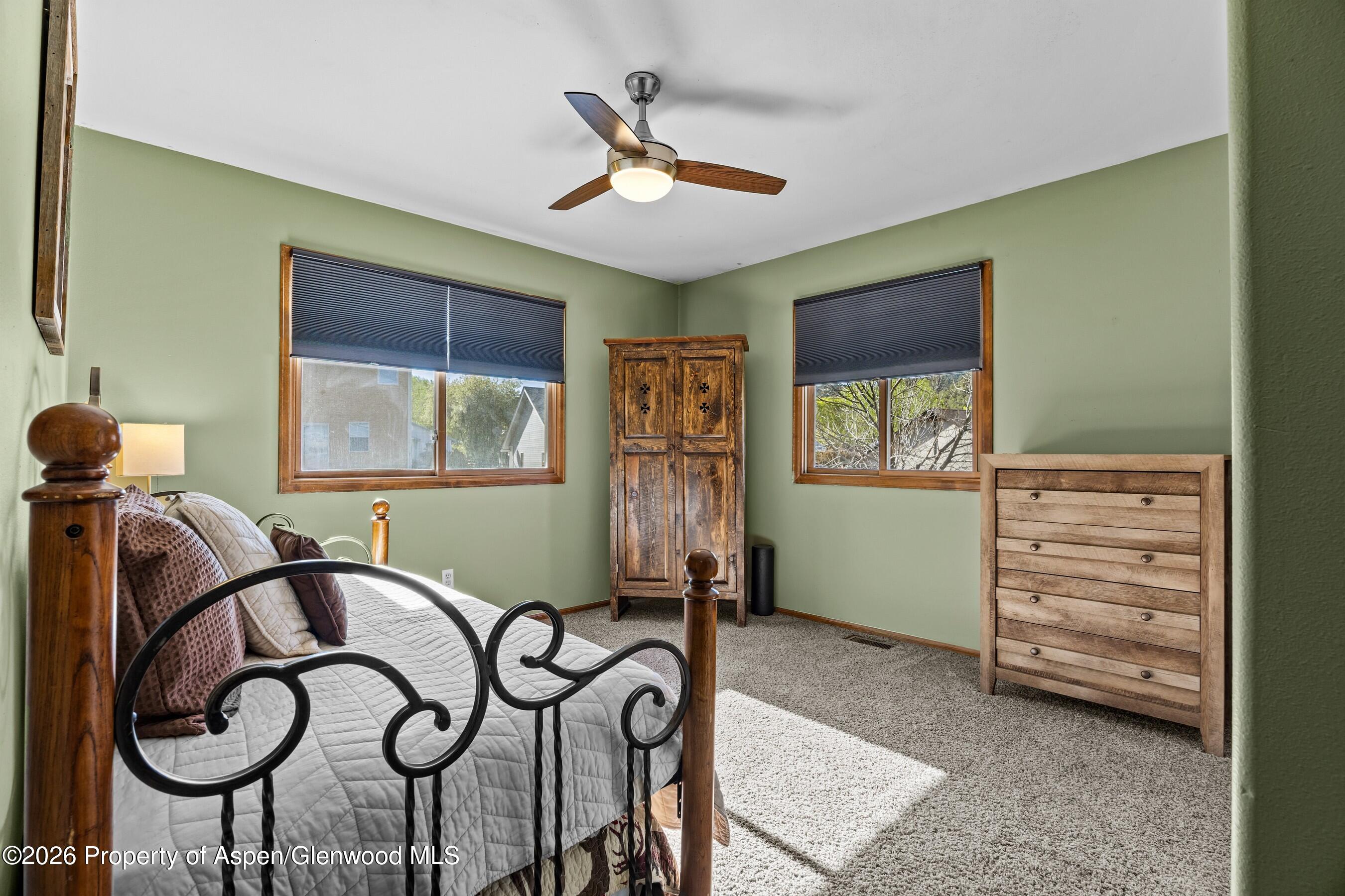 212 Safflower Court New Castle, CO 81647 - Photo 15 of 27 a view of a livingroom with furniture and windows
