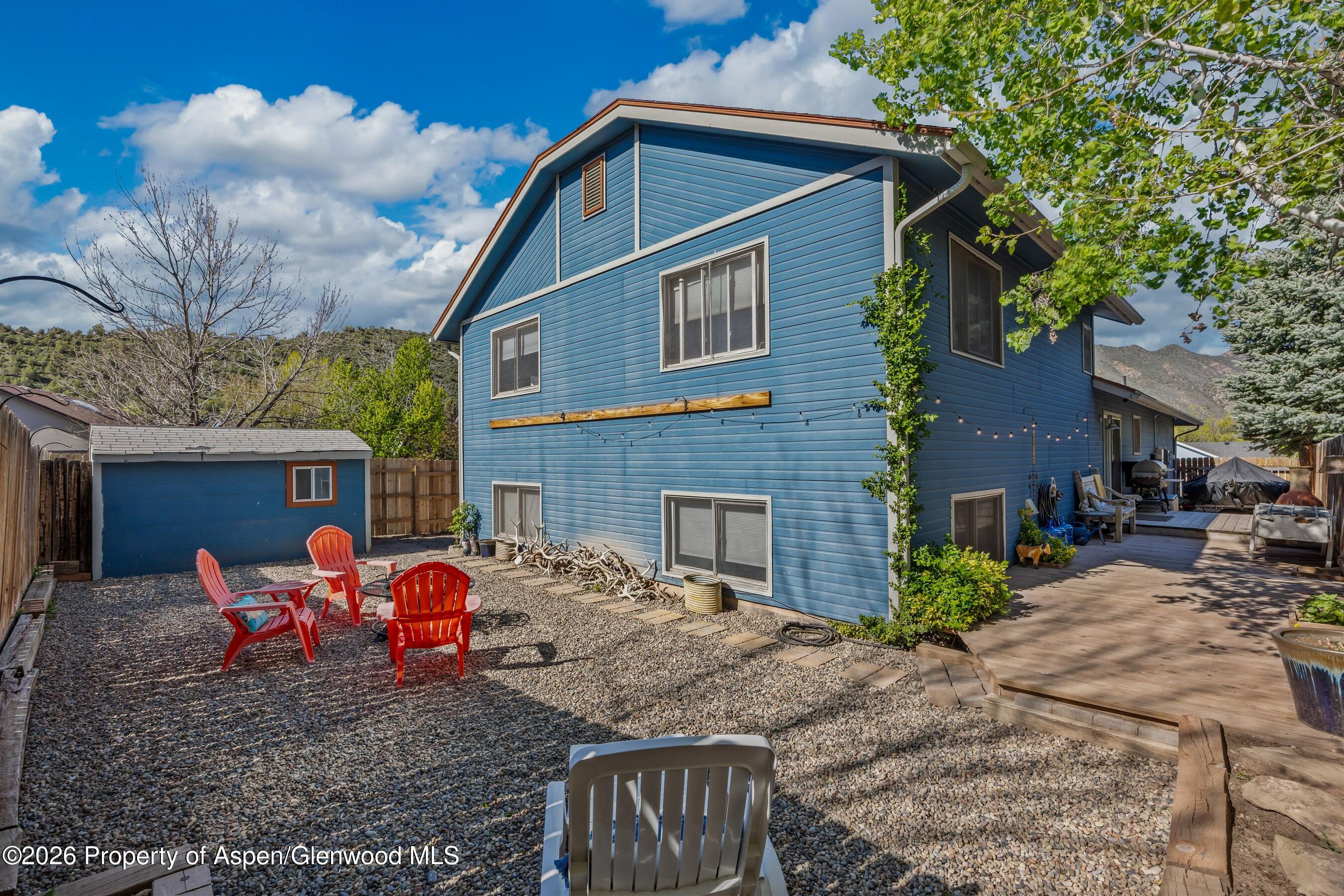 212 Safflower Court New Castle, CO 81647 - Photo 25 of 27 a front view of a house with patio