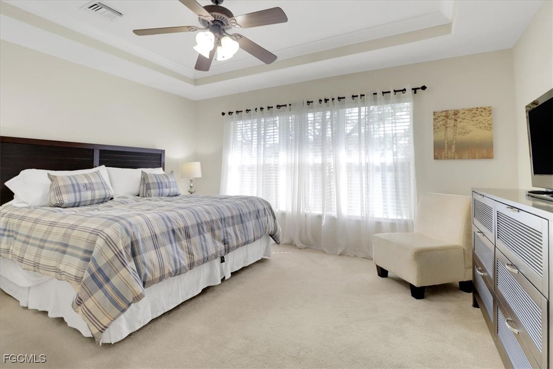 19674 Villa Rosa Loop Estero, FL 33967 - Photo 8 of 33 a spacious bedroom with a bed and a couch