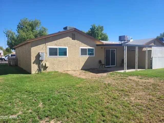 a house view with a garden space