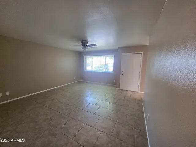 a view of an empty room and window in it