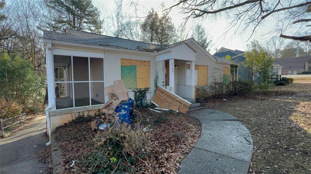 2528 Sylvan Road Atlanta, GA 30344 - Photo 1 of 1 a front view of a house with garden