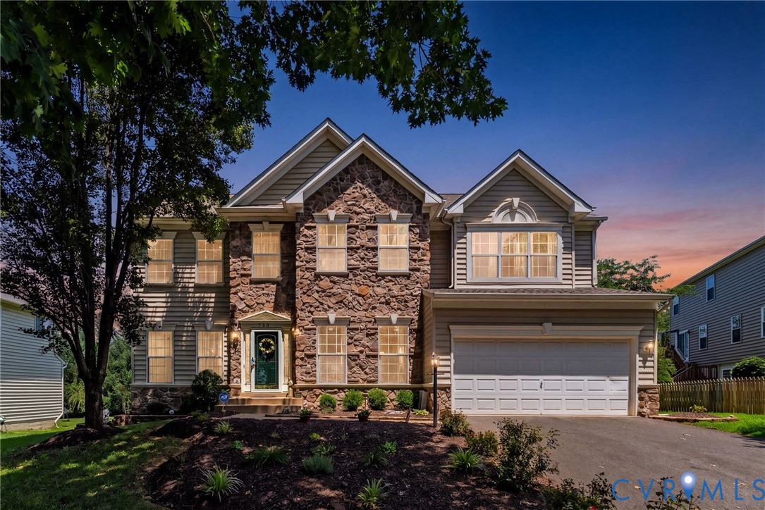 753 Blossom Tree Road Culpeper, VA 22701 - Photo 2 of 68 Stone and siding facade featuring a two-car garage
