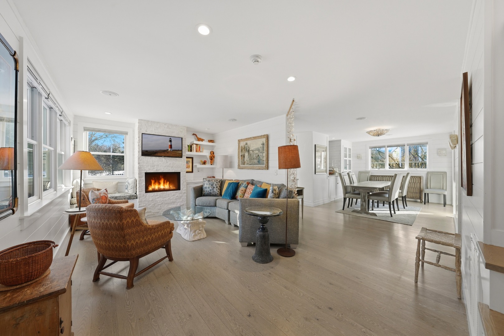 10 Pilgrim Road Nantucket, MA 02554 - Photo 7 of 65 a living room with furniture a fireplace and a table