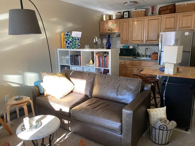 a living room with furniture and a couch