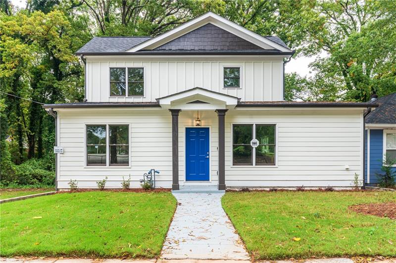 860 Westmont Road Southwest Atlanta, GA 30311 - Photo 1 of 1 a front view of a house with yard