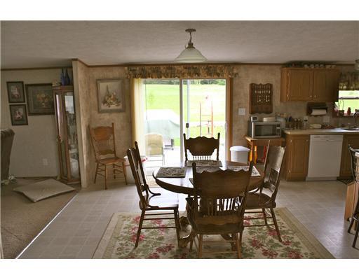 76 Henderson Road Easton, ME 04740 - Photo 11 of 25 Dining Room. Sliding doors from the...